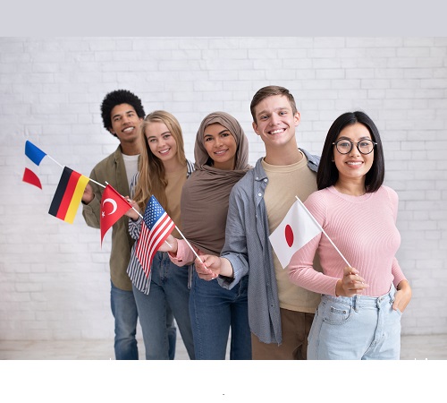 Exchange students and language school for different people. Funny digital young international pupils holding flags of USA, Japan, Turkey, Germany and France in classroom, studio shot, empty space